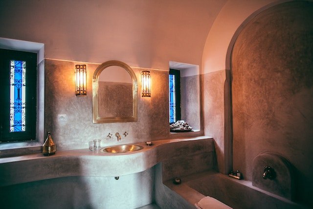 A bathroom with natural stone