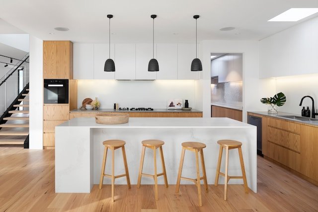A photo of a white kitchen with wooden elements A photo of a white kitchen with wooden elements