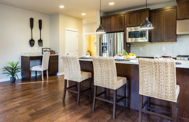 Reclaimed wood backsplashes bring a sense of history and character to your kitchen Reclaimed wood backsplashes bring a sense of history and character to your kitchen