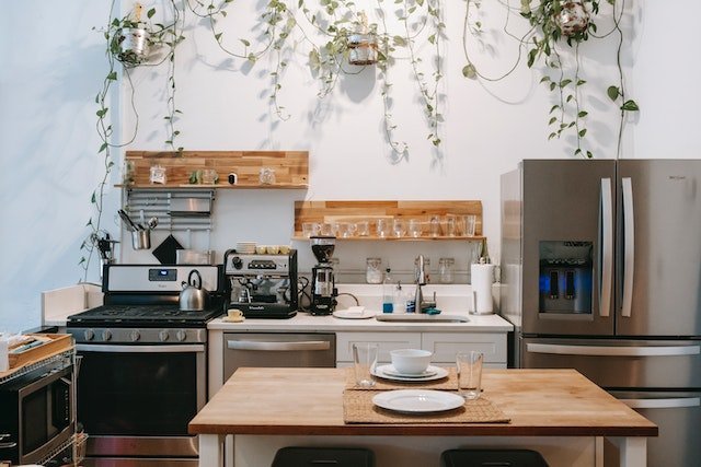 A modern kitchen with open shelving displays