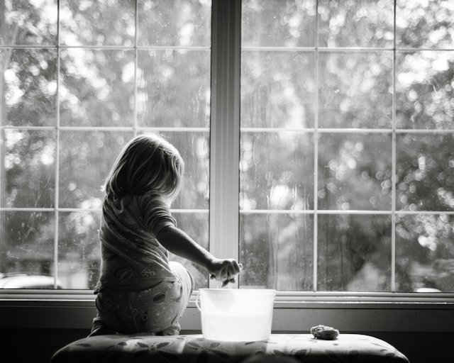 Picture of a person cleaning windows