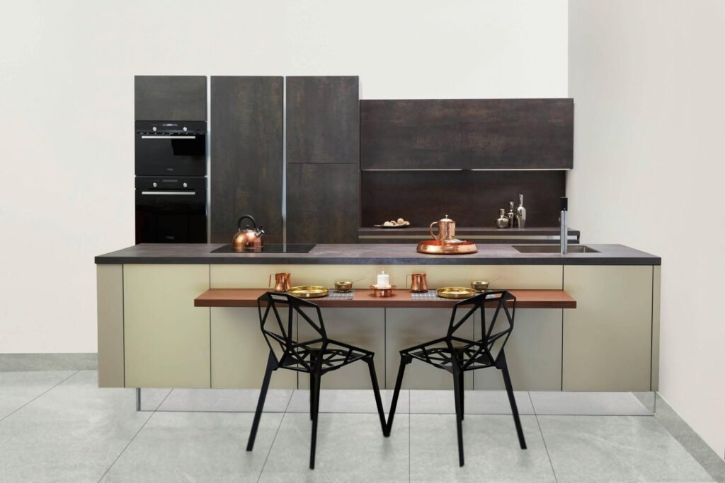 small kitchen with black metal chairs